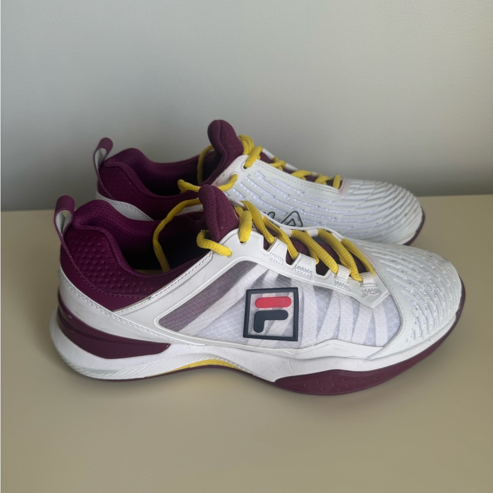 Size 8.5 Women’s tennis shoes, worn once, excellent condition.